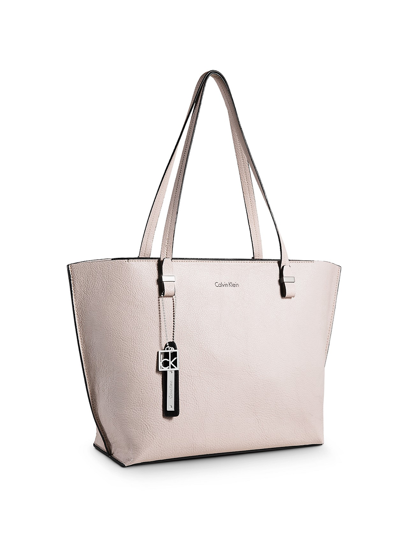Calvin Klein City Shopper Tote, $59.99 (was $119.50) This classic leather tote comes in five colors. I'll take winter white, please and thank you.